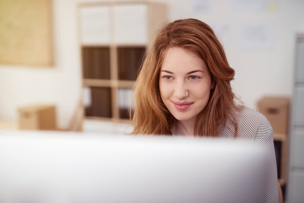 Woman_reviews_data_from_EHR